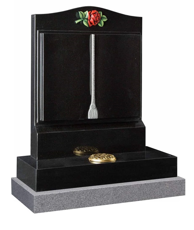 Black granite book design memorial headstone with carved cord and tassel detail and red rose ornament