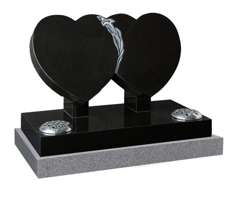 Black granite desk tablet memorial with carved tassel design and side vase