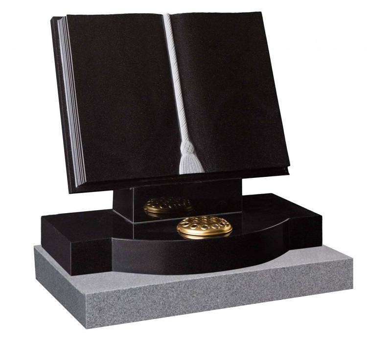 Black granite open book memorial headstone with polished finish and curved base