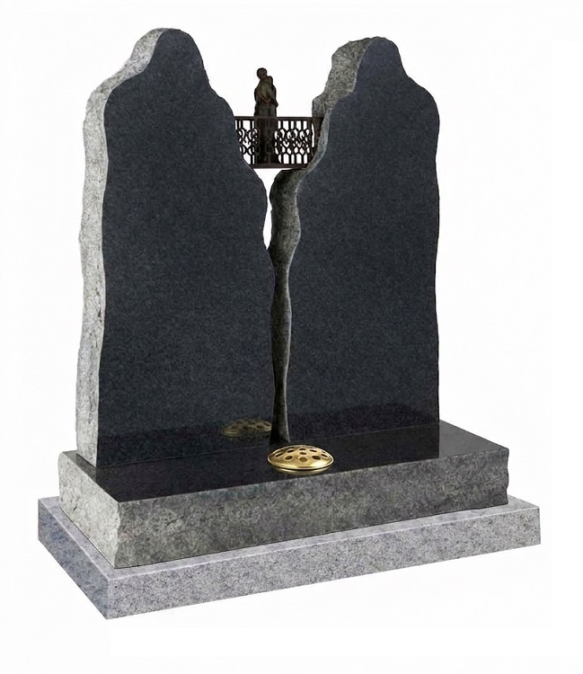 Dark grey granite split headstone with polished black panels and decorative bridge ornament