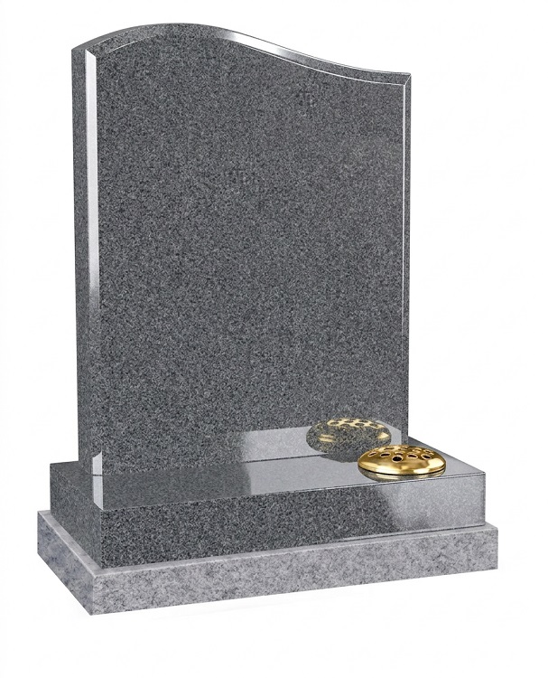 Flint grey granite headstone with polished bevelled edges and curved top